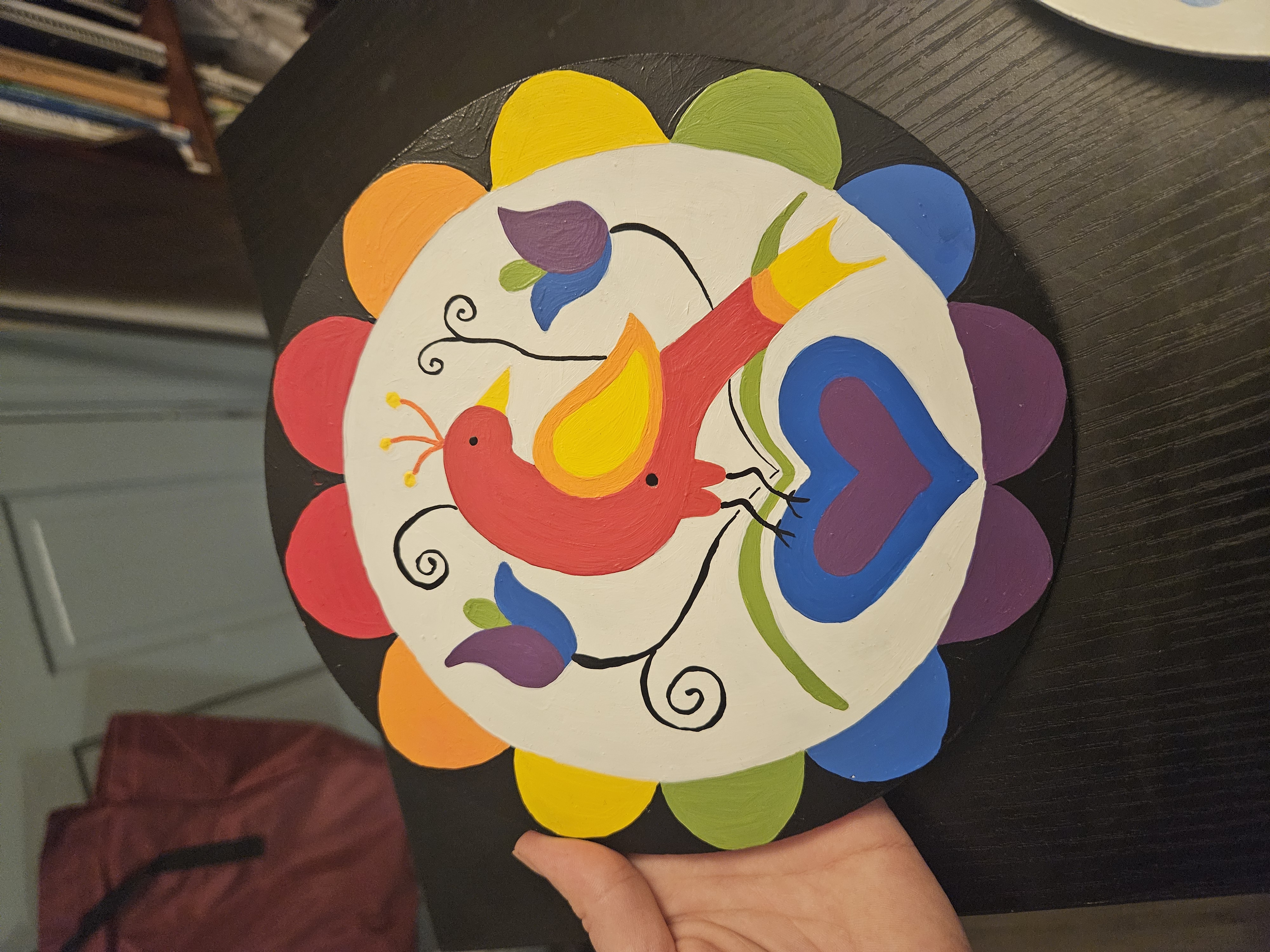 a bird hex in rainbow colors